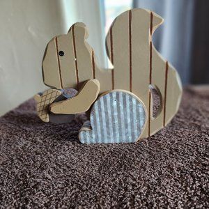 Wood squirrel window display